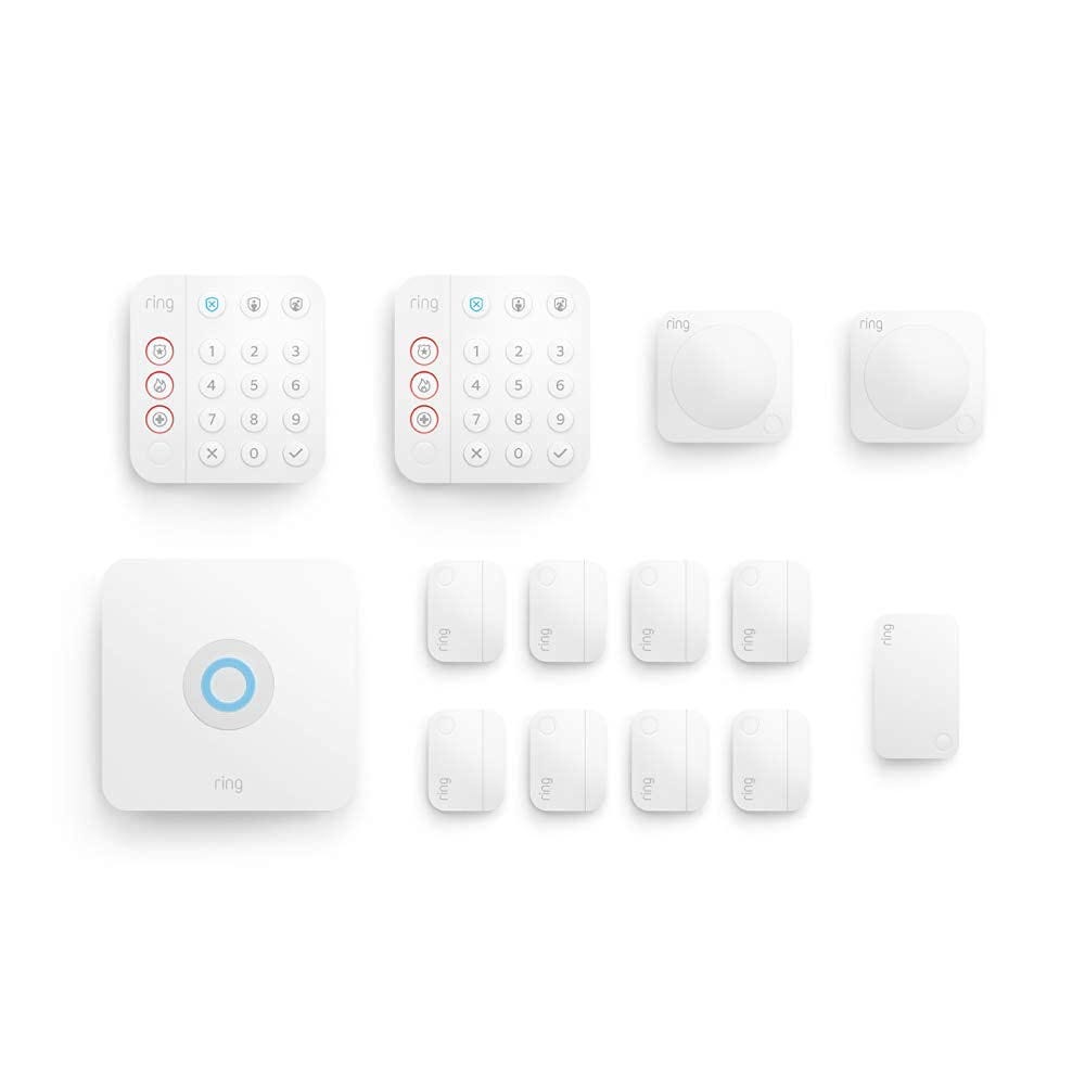 A Ring home security kit including keypads, motion detectors, and contact sensors for doors and windows.