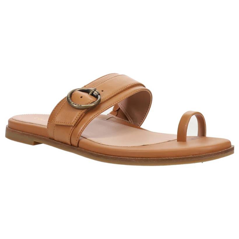 Tan leather slide sandal featuring a toe loop and a wide strap with a decorative buckle.