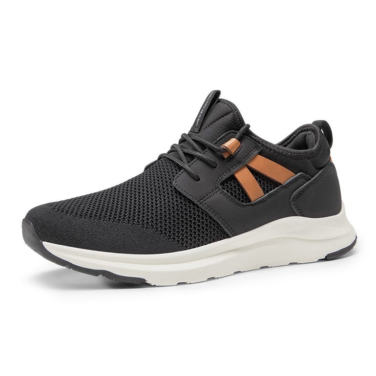 A black athletic sneaker with mesh material, lace-up closure, brown accents, and a white sole.