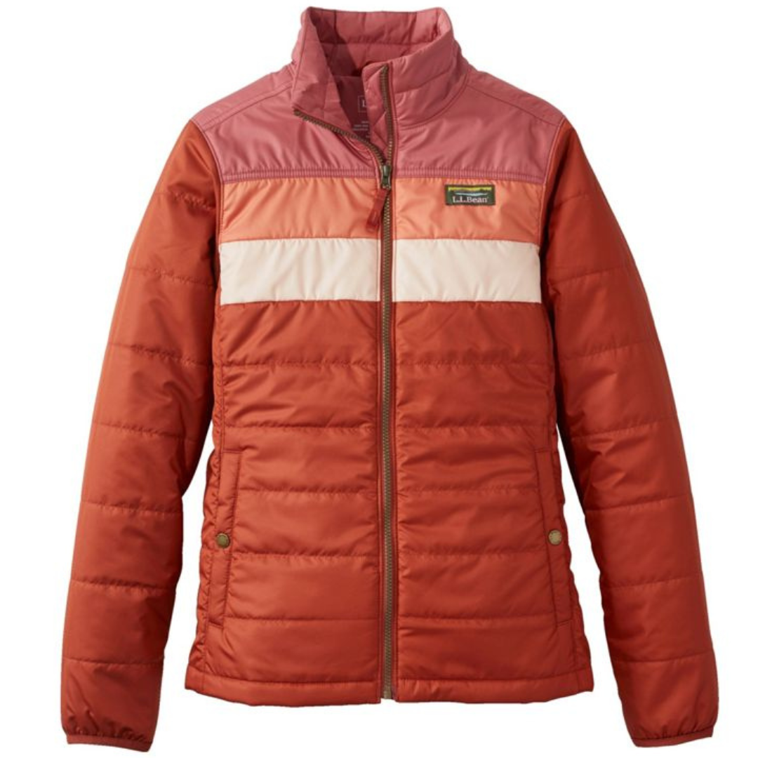 A color-blocked, quilted jacket with shades of red and pink, featuring a high collar, front zipper, and side pockets, branded with a small label on the chest.