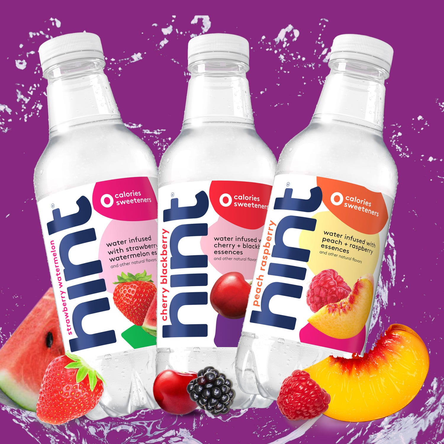 Three bottles of Hint flavored water with watermelon, cherry, and peach varieties, splashed by colorful liquid.