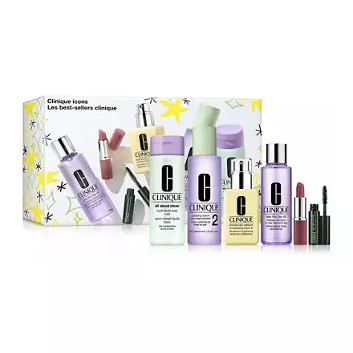Clinique gift set featuring skincare and makeup items: All About Clean Rinse-Off Foaming Cleanser, Clarifying Lotion 2, Dramatically Different Moisturizing Lotion, Take the Day Off Makeup Remover, two lipsticks, and a mascara in a festive box.