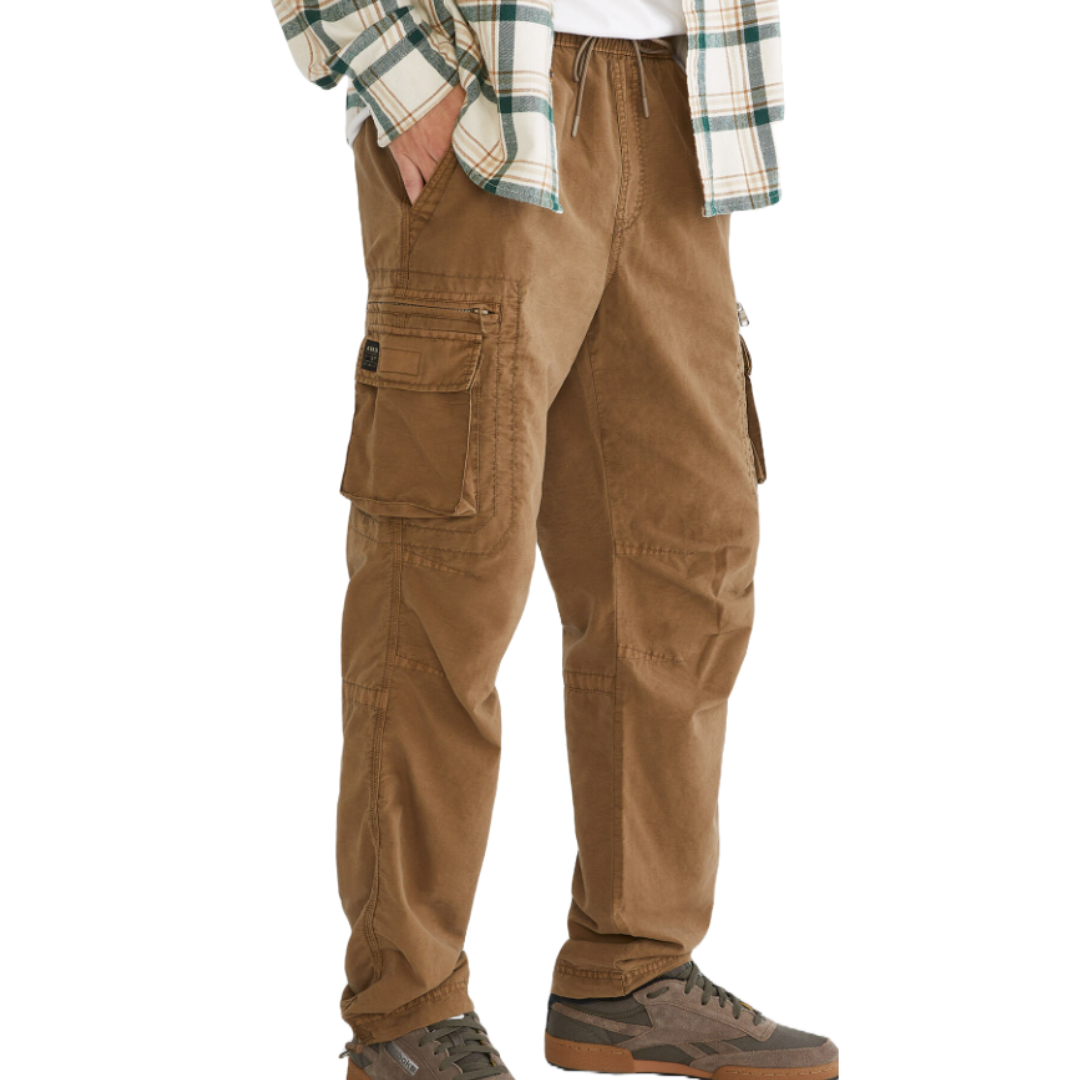 Brown Aeropostale cargo pants with multiple pockets, including large side pockets, paired with brown sneakers and a green and white plaid shirt.