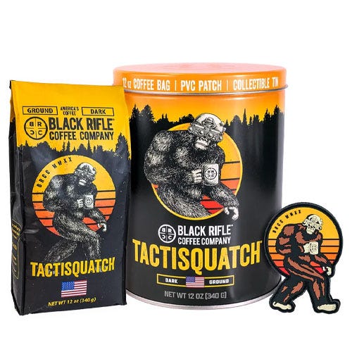The Tactisquatch Coffee Gift Bundle includes a 12 oz bag of ground coffee, a collectible 12 oz tin, and a PVC patch, all featuring a Sasquatch design with a tactical theme from Black Rifle Coffee Company.