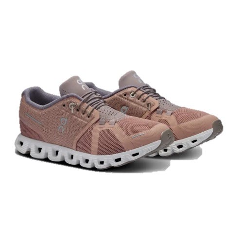 A pair of pink and gray athletic shoes with a unique, segmented white sole design and \“on\“ branding on the side.