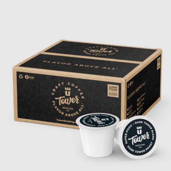 A box of Tower craft coffee pods with a single pod displayed in front.
