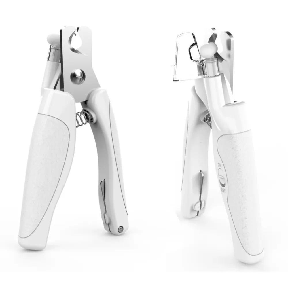 White garlic press and electric can opener, both with ergonomic designs.