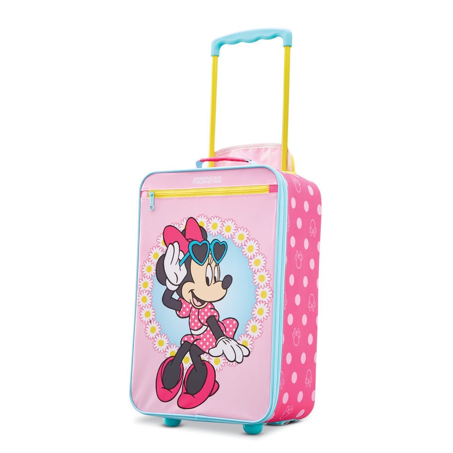 A pink children's rolling suitcase with a graphic of Minnie Mouse surrounded by colorful flowers.