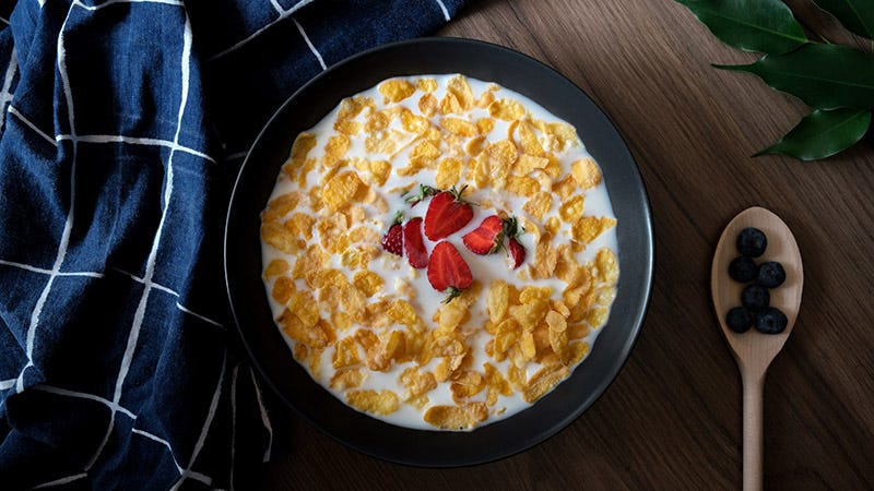 generic cereal in bowl with milk