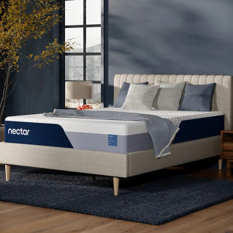 Nectar Classic Memory Foam Mattress featuring a sleek quilted design, displayed in a modern bedroom with neutral tones and elegant décor.