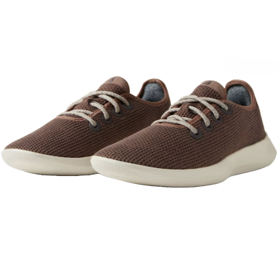 Allbirds Women's Tree Runners are eco-friendly sneakers with a light brown mesh upper, cream laces, and a cushioned cream sole. Designed for comfort and breathability, these shoes are ideal for everyday wear.