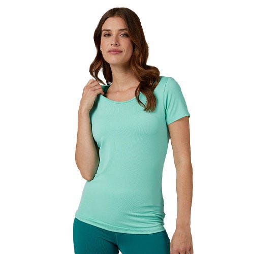 A woman models a mint green, short-sleeve 32 Degrees Cooling T-Shirt, featuring a fitted design.
