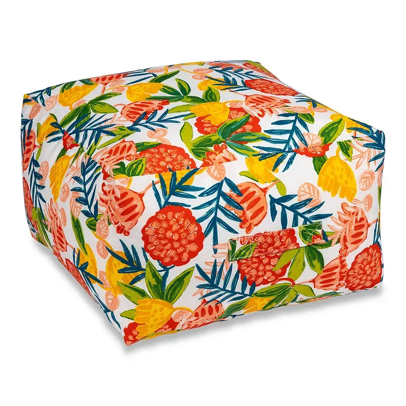 Brightly colored tropical-patterned bean bag with pineapple and floral designs.