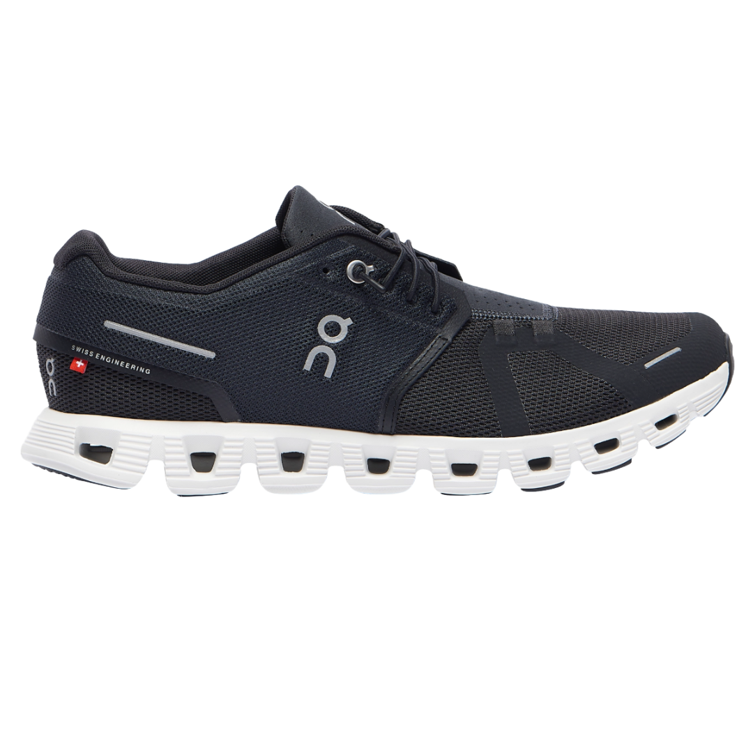 On Cloud Men's Shoes feature a sleek design with a dark mesh upper, white CloudTec sole, and laced closure, known for Swiss engineering. The sole highlights multiple cutouts for cushioning and flexibility.