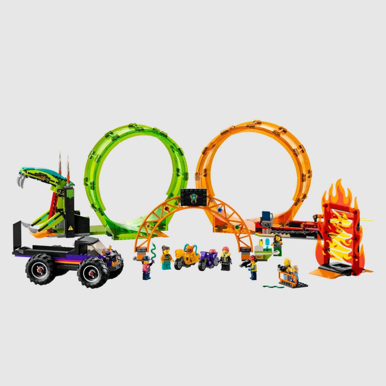 Colorful toy roller coaster set with loops, a truck, and figurines.