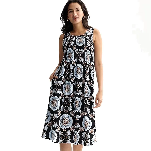 Sleeveless midi dress with a black background, featuring a blue and brown floral pattern.
