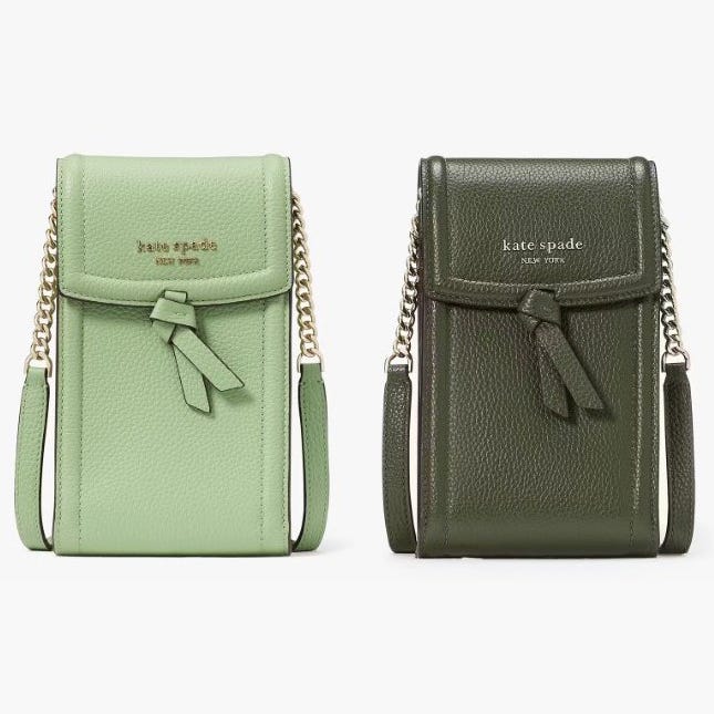 Two Kate Spade smartphone crossbody bags, one in light green and another in dark green, featuring a front flap, bow detail, and chain strap.
