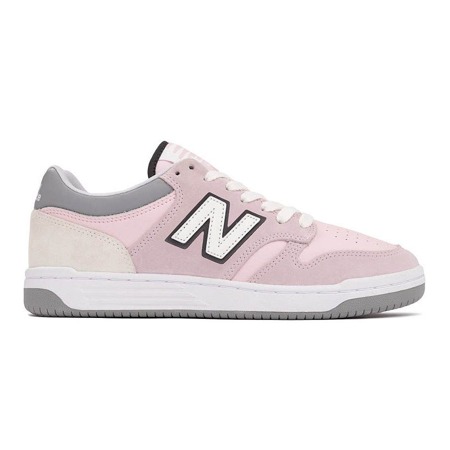 Pink and gray New Balance sneaker with a white \“N\“ logo on the side, featuring a white midsole and gray outsole.