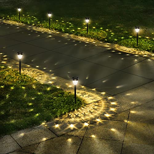 This is a set of 10 LED solar path lights installed along a walkway, casting star-shaped patterns on the ground during nighttime.