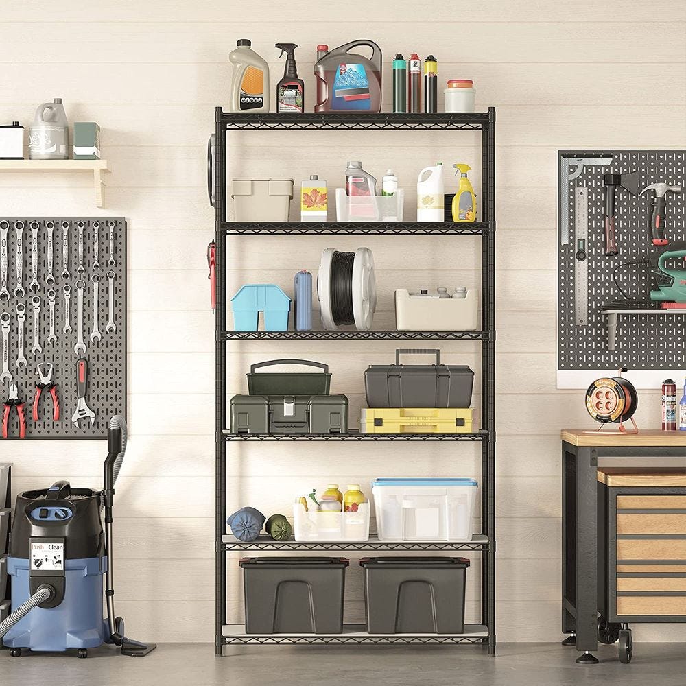 Metal shelving unit storing various items, including cleaning supplies, tools, storage boxes, and an industrial vacuum cleaner.