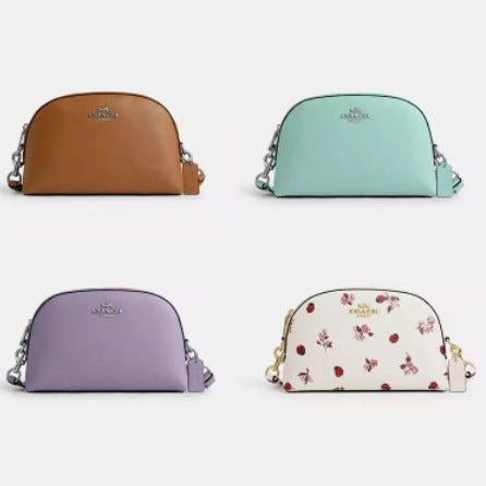 Four dome-shaped crossbody bags in different colors, one with a floral pattern.