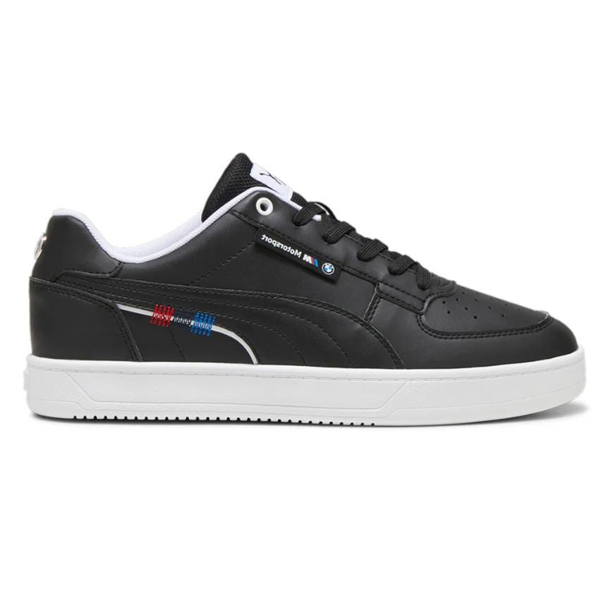 A black sneaker with white soles featuring BMW Motorsport branding, including blue and red accents and a Puma logo on the side.