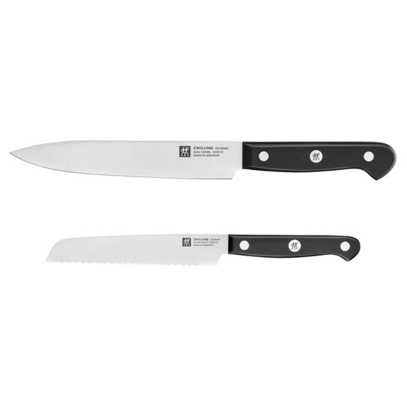 A 2-piece Zwilling knife set featuring a chef's knife and a serrated utility knife, each with a black handle and stainless steel blade.