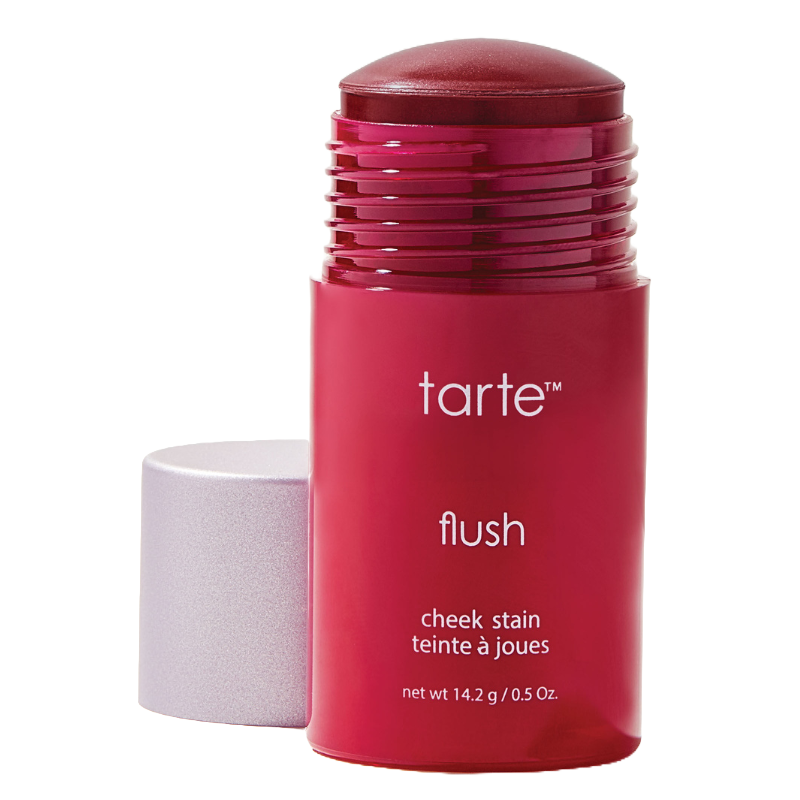 Tarte Cosmetics Cheek Stain in \“Flush\“ is a vibrant red stick designed for easy and buildable application on cheeks. The packaging is cylindrical with a shimmering silver cap, containing 14.2 g (0.5 oz) of product.