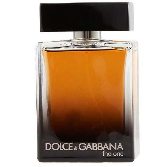Dolce & Gabbana The One fragrance bottle with an amber gradient design and a black cap.