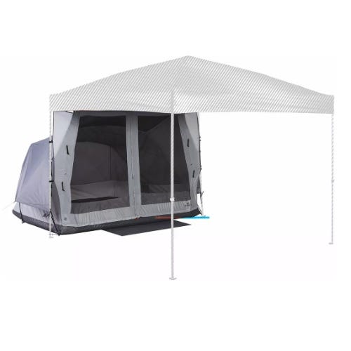 A gray camping tent is set up under a white canopy with two supporting poles at the front. The tent features a zippered front entrance.