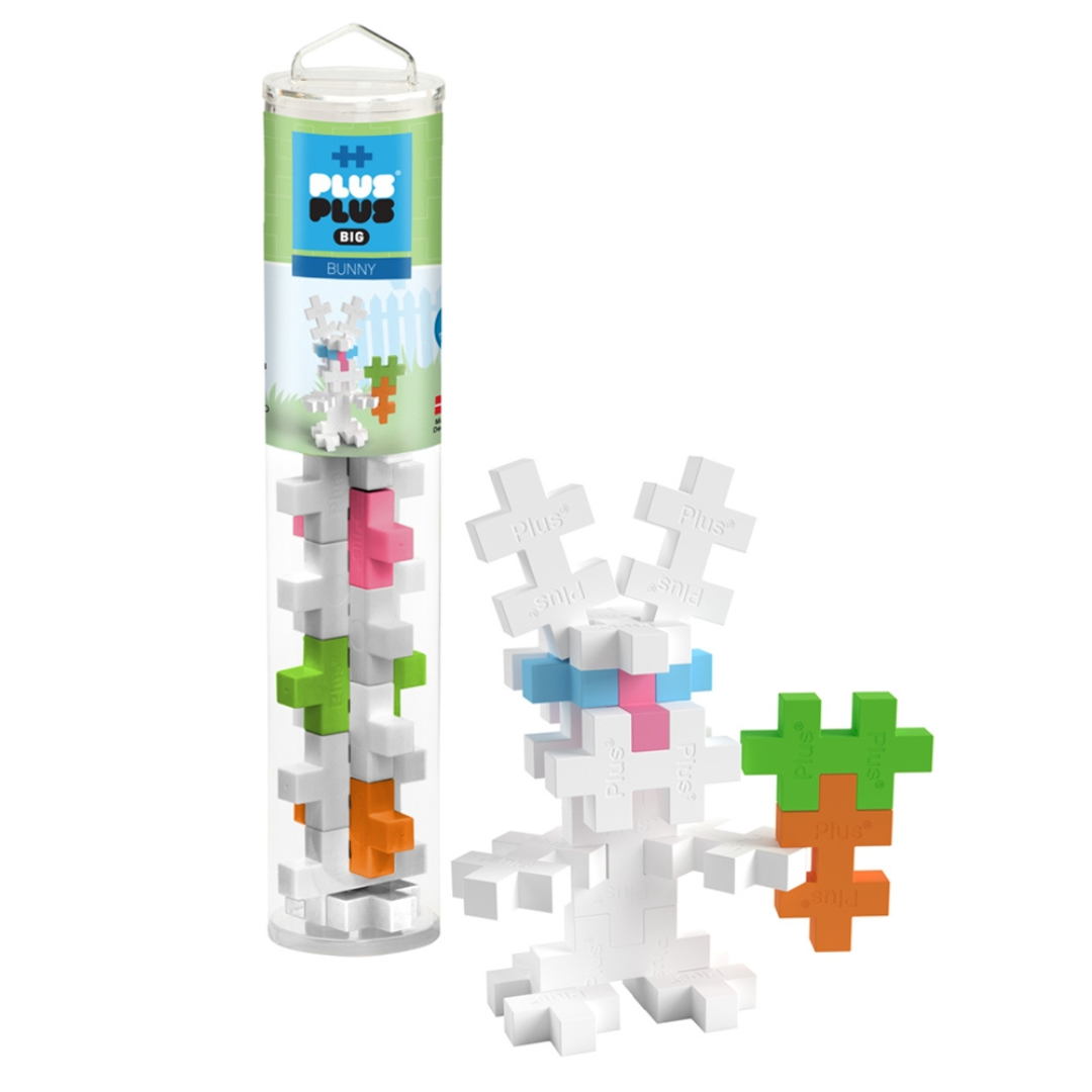 A clear tube packaging with Plus-Plus Big building blocks and a constructed bunny figure made from the same blocks.