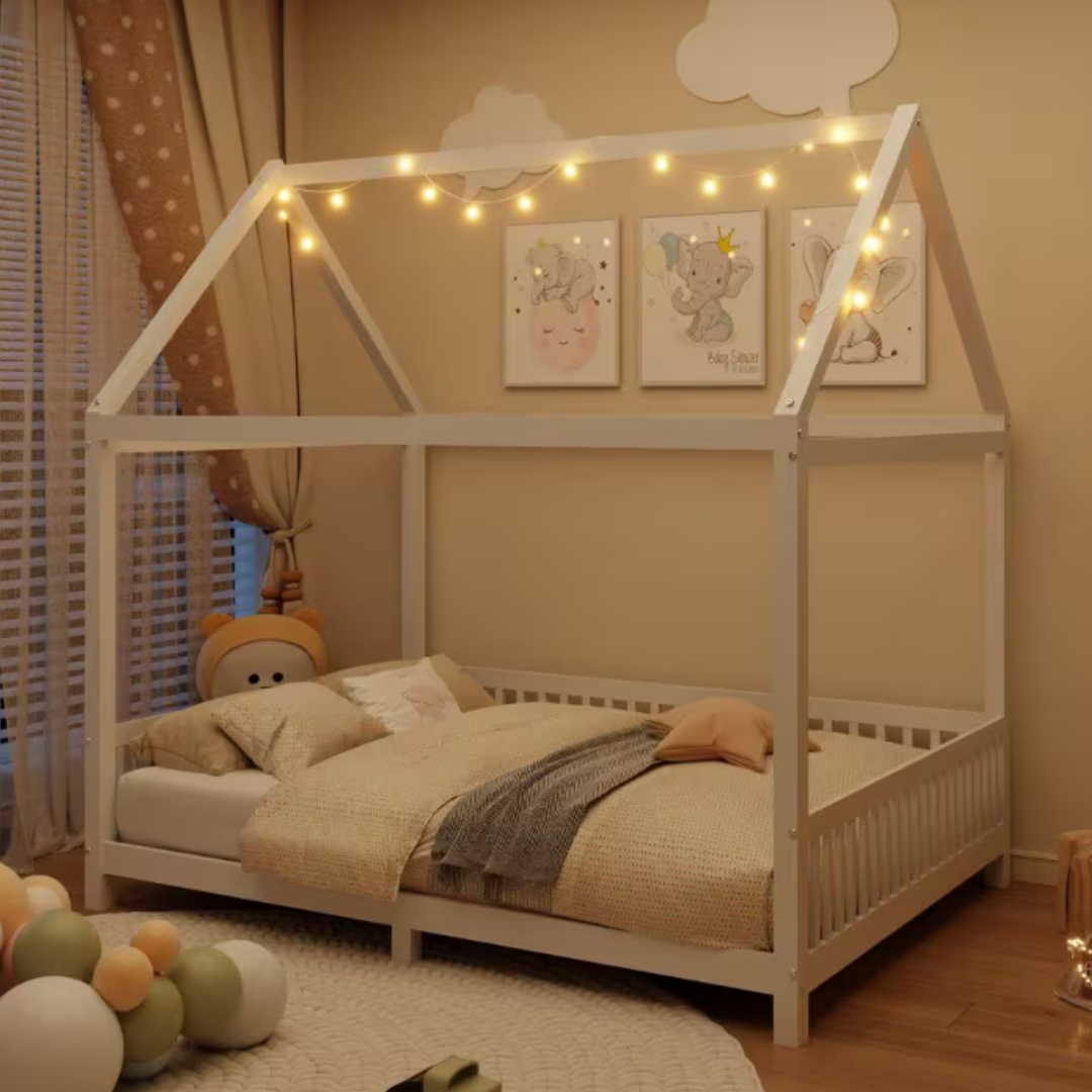 White platform bed with a house-shaped frame, featuring a guardrail and adorned with string LED lights. The room is decorated in warm tones with cloud-shaped wall accents and playful animal-themed artwork.