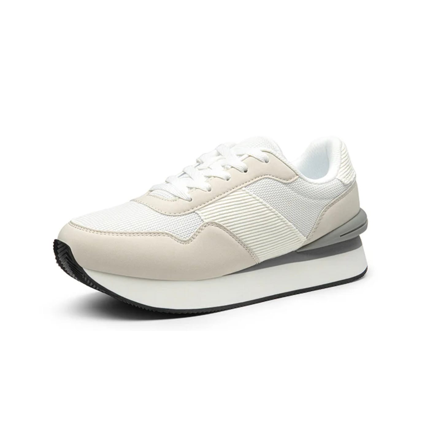 A pair of women's platform sneakers in shades of white and beige with a textured pattern on the sides and a thick, slightly elevated sole.