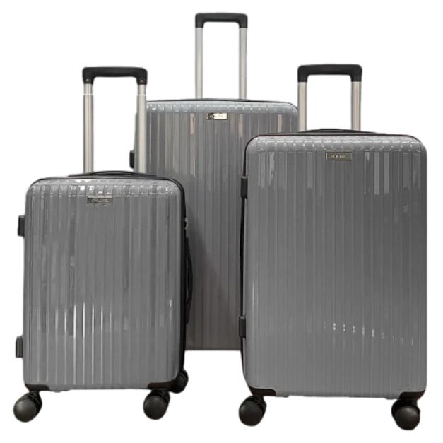A 3-piece hardside luggage set in metallic gray, featuring textured surfaces, telescopic handles, and four double-spinner wheels for easy mobility.