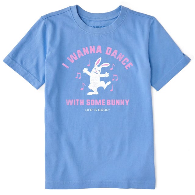 Blue T-shirt featuring a white bunny dancing with musical notes around it, accompanied by the text \“I Wanna Dance With Some Bunny\“ and \“Life is Good\“ in pink.