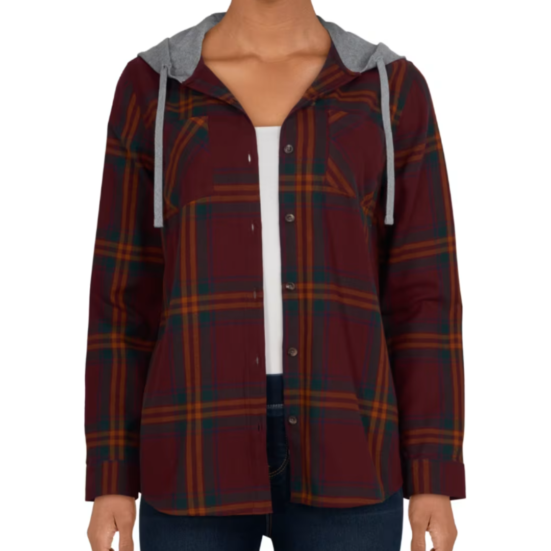 A women's hooded flannel shirt in a burgundy plaid pattern with orange and green stripes, featuring a gray hood with drawstrings and button-up closure. The shirt is worn over a white top and paired with dark jeans.