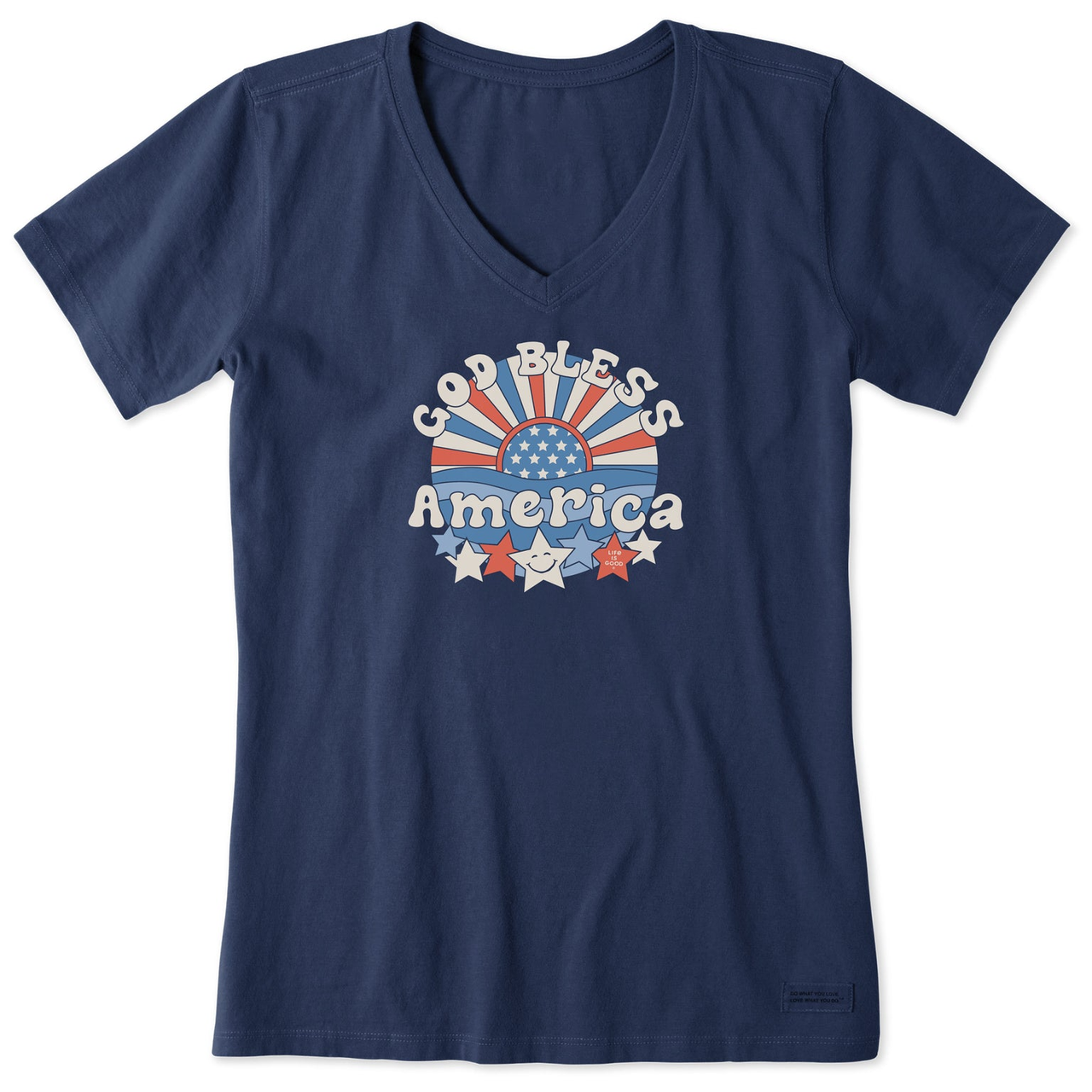 Navy blue V-neck t-shirt with \“God Bless America\“ in retro font, featuring a sunburst design and stars in red, white, and blue.