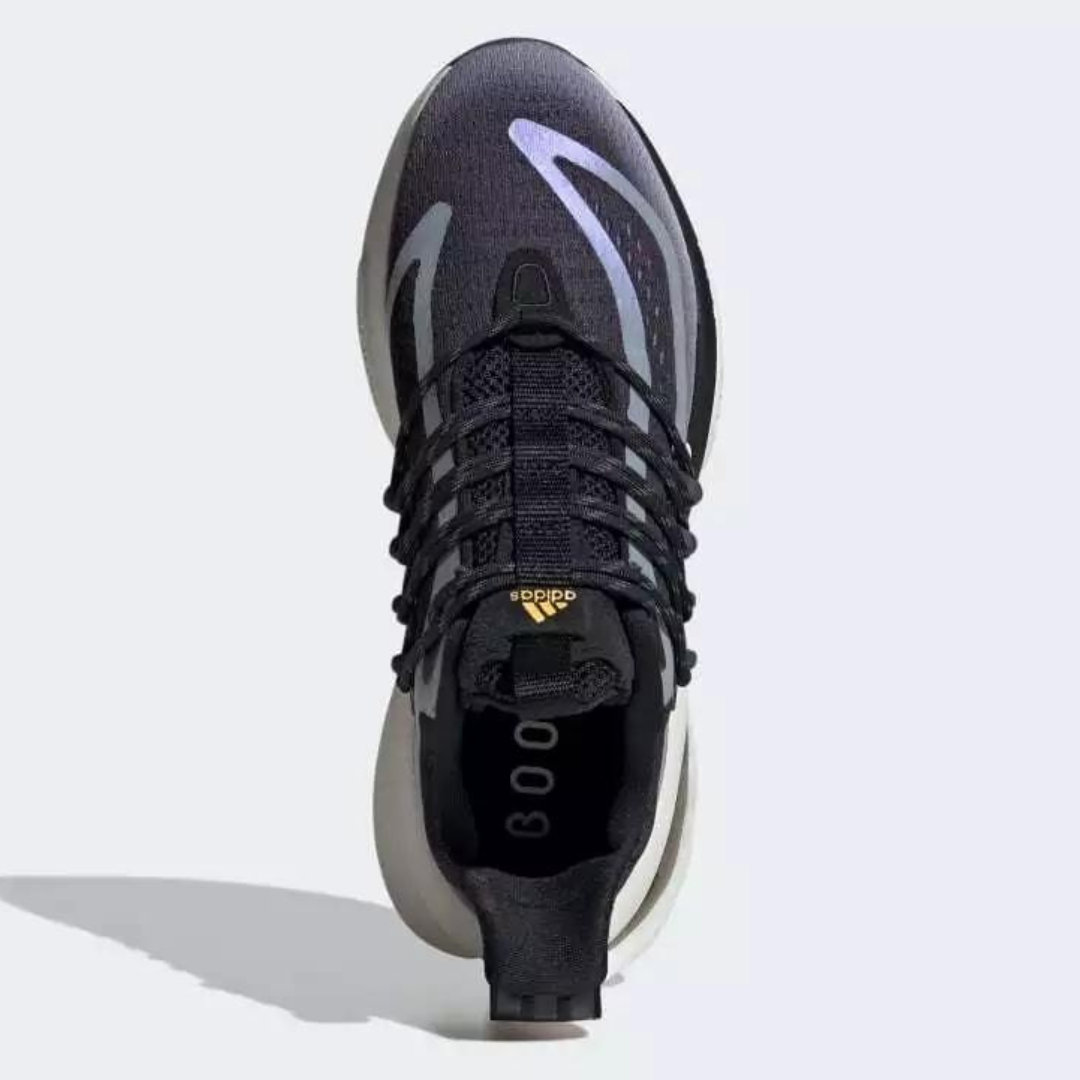 A single black athletic shoe with a textured upper design and white accents on the toe.