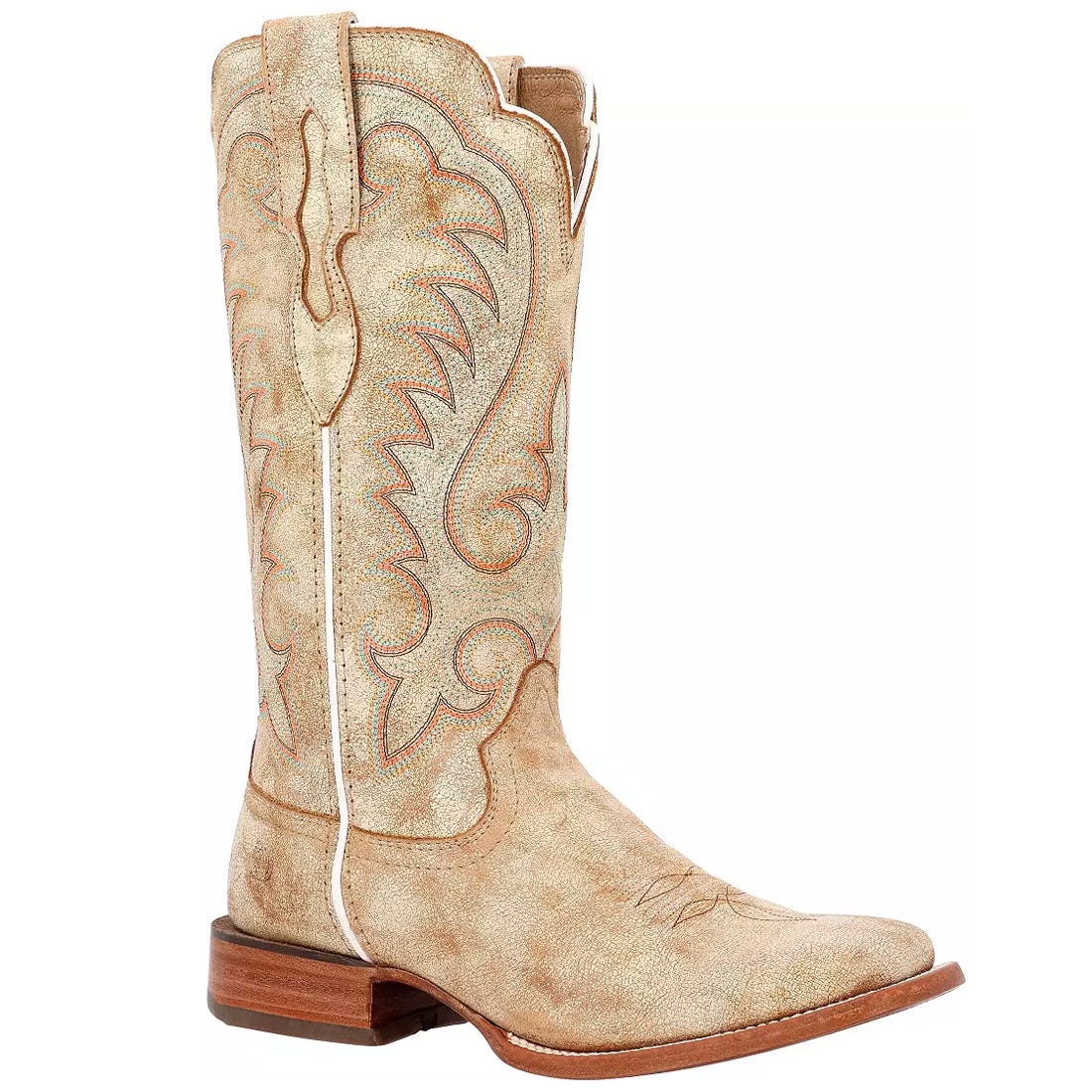 The Durango Arena Pro Cremello Western Boot features a tall, tan leather upper with intricate, swirling stitching patterns. It has a square toe, pull-on loops, and a wooden heel, offering a classic Western design.
