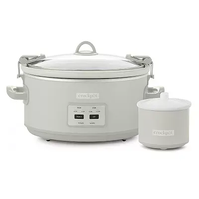 A 7-quart white Crockpot with digital controls is paired with a smaller white Little Dipper warmer, both with matching handles and lids.