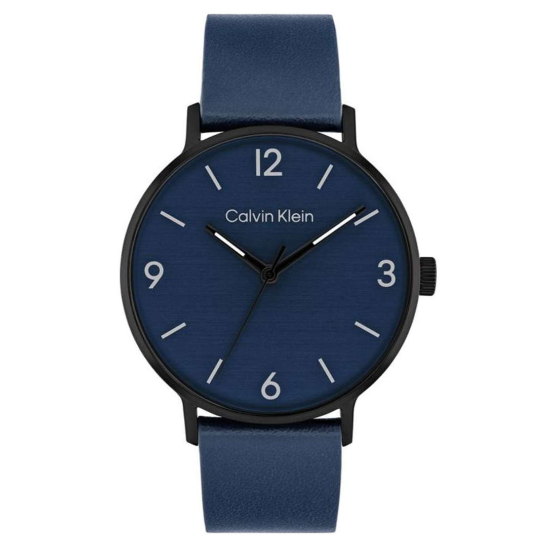 Calvin Klein men's watch with a minimalist design features a navy blue dial and matching leather strap. The black case includes white numerals at 12, 3, 6, and 9, with slim hour markers and hands.