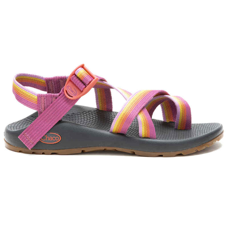 Chaco Z/2 Classic Sandal features a strappy design with adjustable pink and yellow straps, a sturdy black footbed, and a brown outsole, designed for comfort and support.