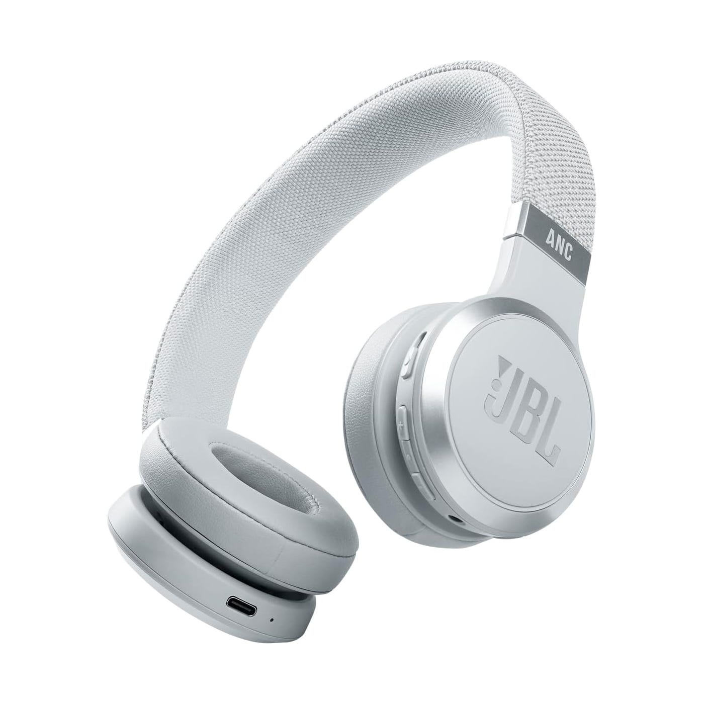 White JBL over-ear headphones with Active Noise Cancelling (ANC), featuring cushioned ear cups, a fabric-covered headband, control buttons on the ear cup, and a USB-C charging port.