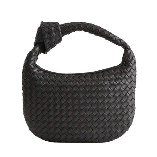 A black woven handbag with a rounded shape and a knotted handle.