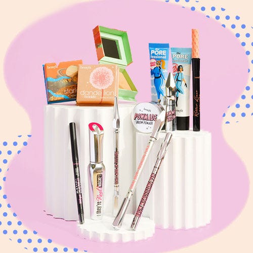 A collection of makeup items including brushes, pencils, and cosmetic products.