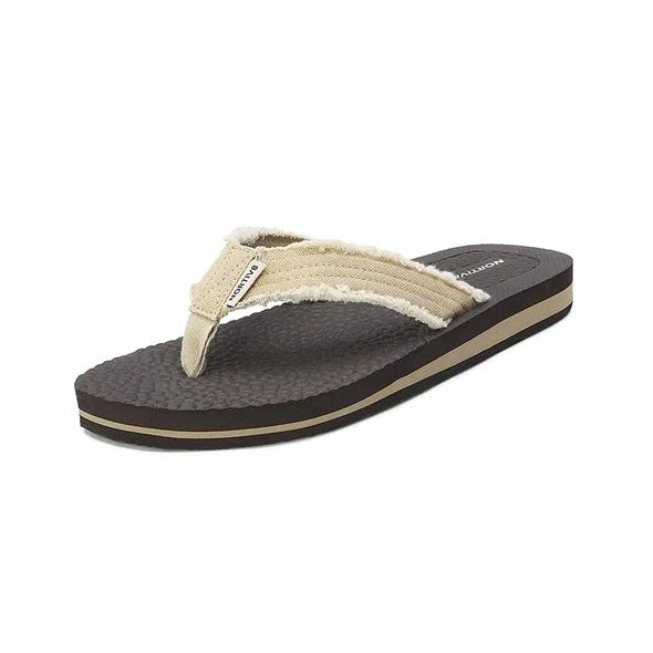 Casual flip-flop with canvas strap and textured footbed.