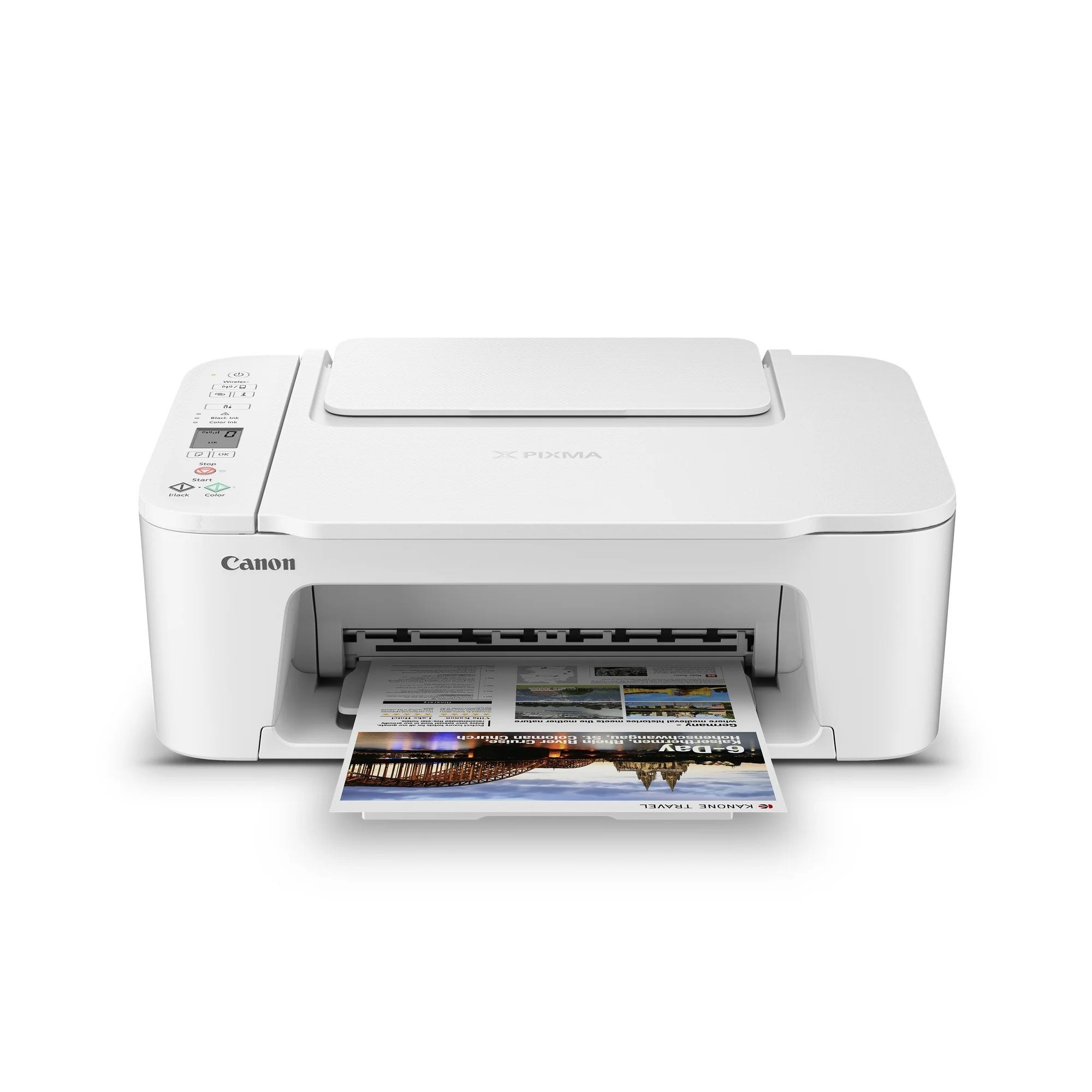 White Canon PIXMA printer with printed color photos emerging from the output tray.