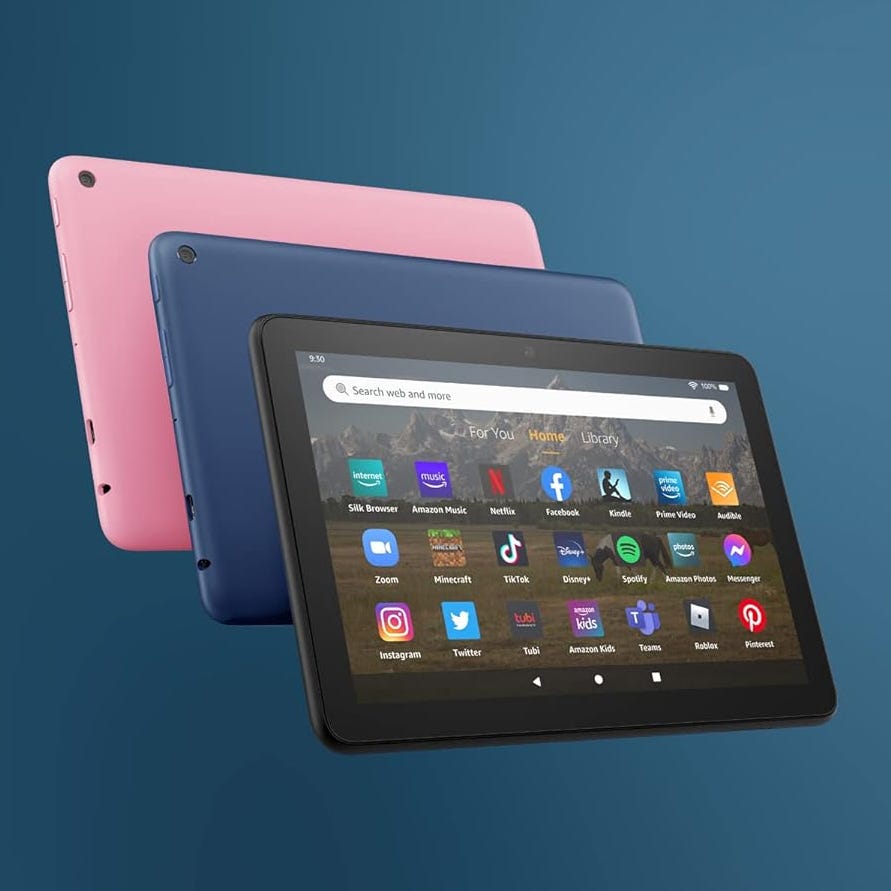 Three tablet computers in pink, blue, and black colors, displayed with their screens showing various apps.