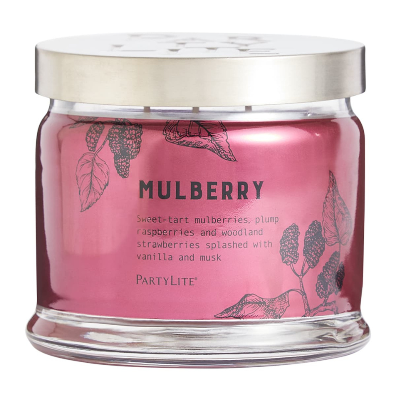 PartyLite Mulberry Candle features a pink jar with black line drawings of mulberries and leaves, offering a fragrance blend of sweet-tart mulberries, raspberries, strawberries, vanilla, and musk, with a silver lid.