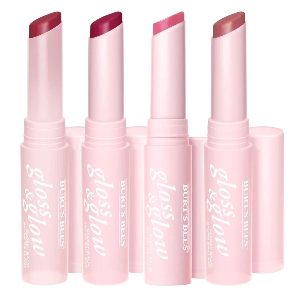 A 4-pack of Burt's Bees Gloss & Glow lip balms in a pink and white design, featuring a variety of shades.